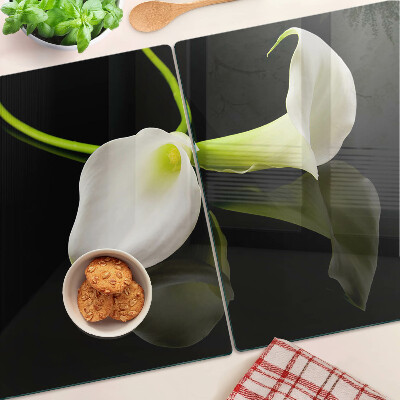 Schneidebrett Glas mit Lilienmotiv auf schwarzem Hintergrund