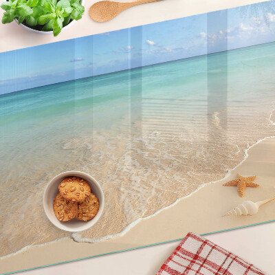 Schneidebrett mit Strandmotiv mit Muscheln und Wellen