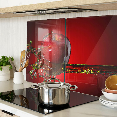 Glas schneidebrett Roter Apfel mit Wasser