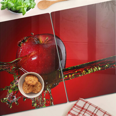 Glas schneidebrett Roter Apfel mit Wasser