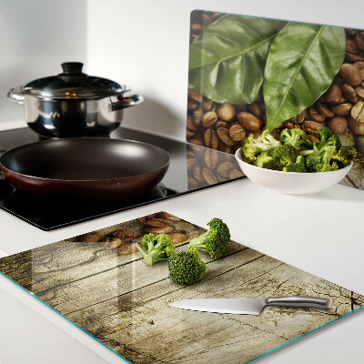 Schneidebrett glas Kaffee und Blätter