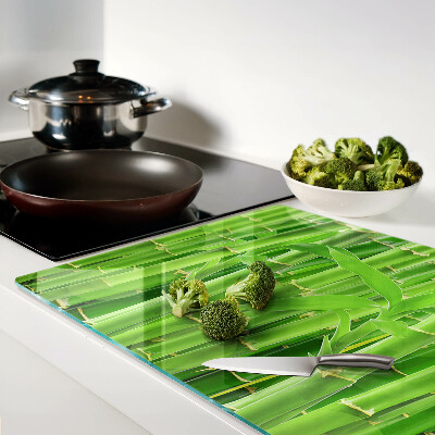 Glas Schneidebrett mit Motiv aus Bambusblättern und -stängeln