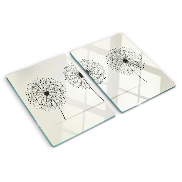 Schneidebrett mit Löwenzahn-Motiv auf weißem Hintergrund