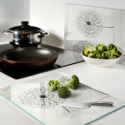 Schneidebrett Löwenzahn auf weißem Hintergrund