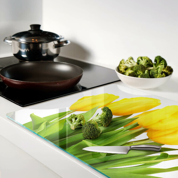 Schneidebrett Gelbe Tulpen auf grünem Hintergrund