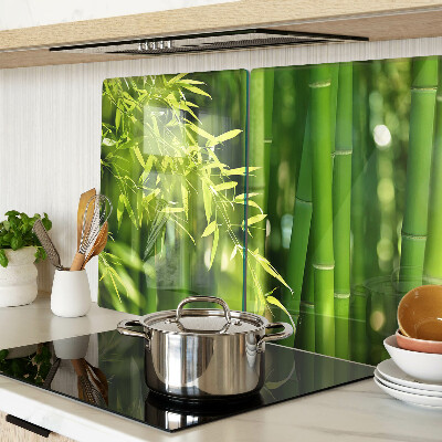 Schneidebrett Glas mit Motiv aus Bambusblättern und grünem Laub