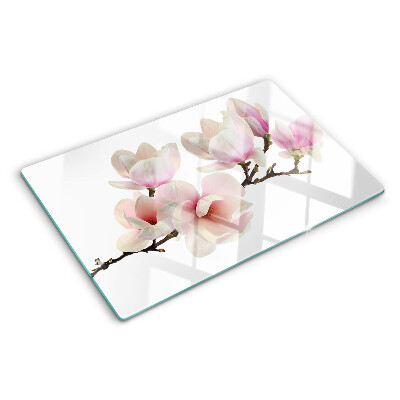 Glas-Schneidebrett mit Motiv von Magnolienblüten an einem Zweig