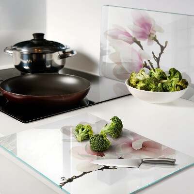 Glas schneidebrett Magnolienblüten an einem Zweig