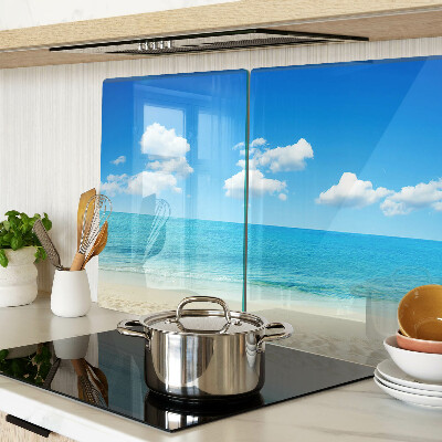 Schneidebrett mit Strandmotiv und blauem Himmel