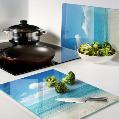 Schneidebrett Strand mit blauem Himmel