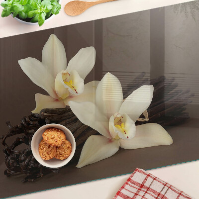 Glas schneidebrett Orchideen und Vanilleschoten