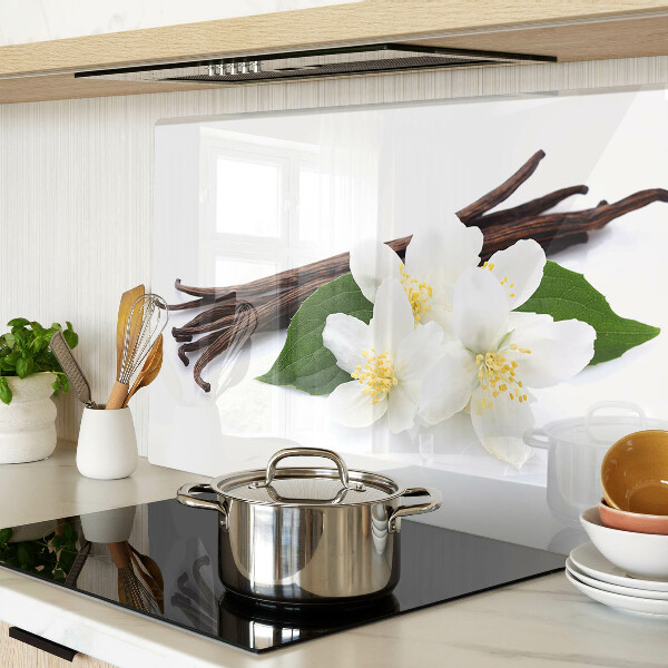 Schneidebrett mit Motiv aus Vanilleblüten und -schoten