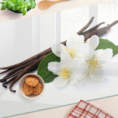 Schneidebrett Vanilleblüten und -schoten