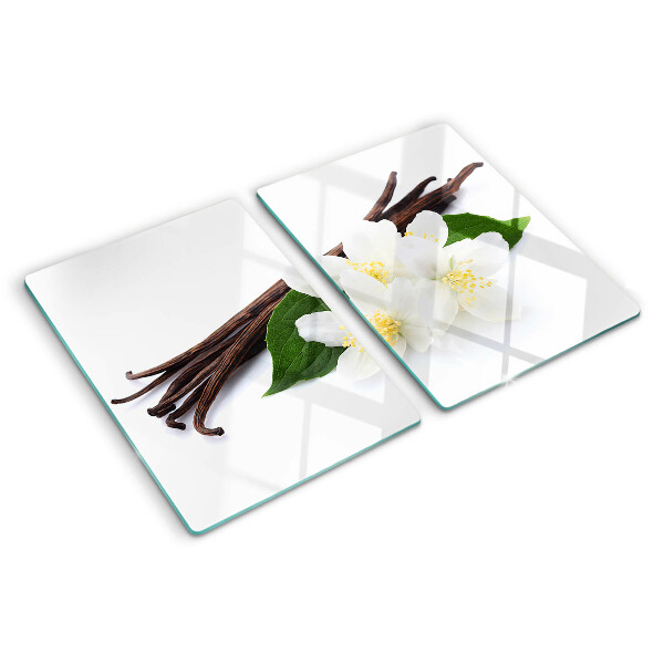 Schneidebrett mit Motiv aus Vanilleblüten und -schoten