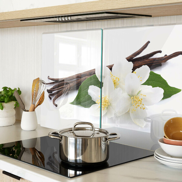 Schneidebrett mit Motiv aus Vanilleblüten und -schoten