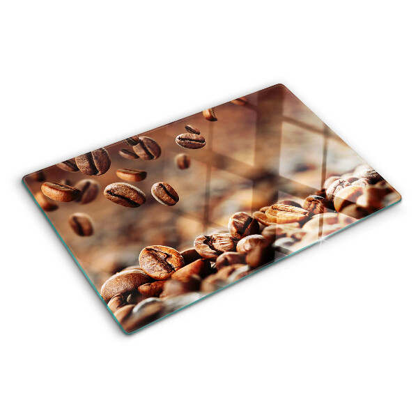 Schneidebrett mit Motiv „Kaffeebohnen in Bewegung”