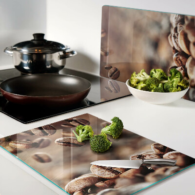 Schneidebrett mit Motiv „Kaffeebohnen in Bewegung”