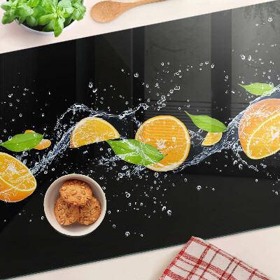 Schneidebrett mit Motiv von Zitrusfrüchten in Wasser