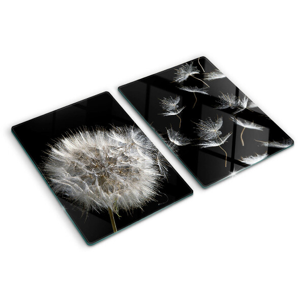 Schneidebrett Glas mit Löwenzahnmotiv auf schwarzem Hintergrund