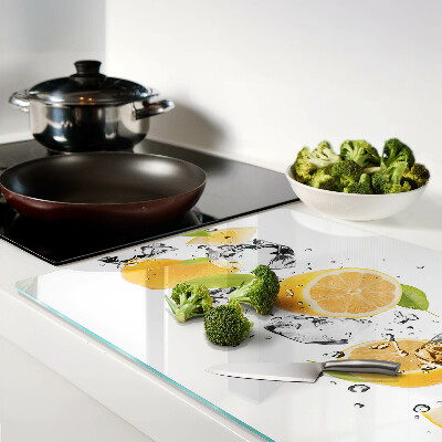 Schneidebrett mit Motiv von Zitronen und Eis