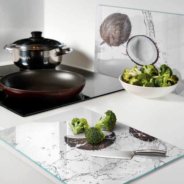 Schneidebrett mit Motiv von Kokosnüssen im Wasser