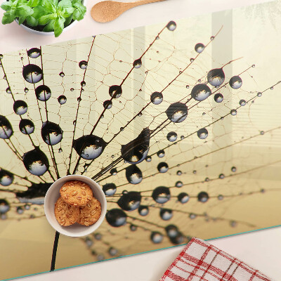 Schneidebrett mit Motiv von Wassertropfen auf einem Spinnennetz