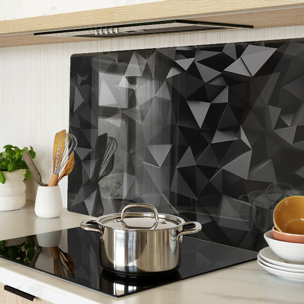 Glas-Schneidebrett mit geometrischem Polygonmotiv in Schwarztönen
