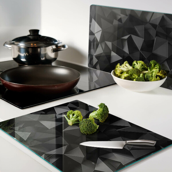Glas-Schneidebrett mit geometrischem Polygonmotiv in Schwarztönen