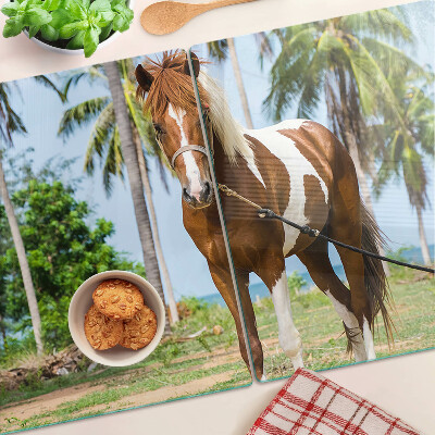 Schneidebrett glas Ein Pferd vor Palmen im Hintergrund