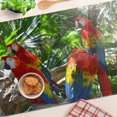 Glas schneidebrett Papageien in einer tropischen Umgebung