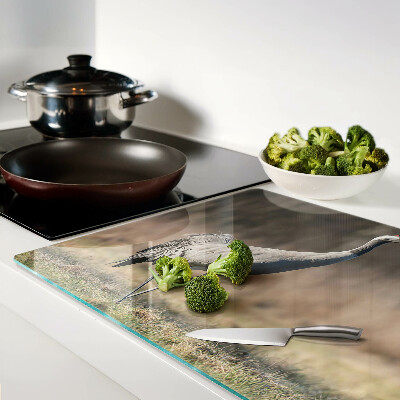 Schneidebrett Glas mit Motiv eines Krans vor einer Landschaft