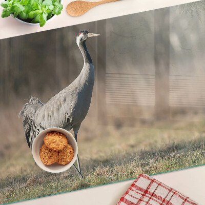 Schneidebrett Glas mit Motiv eines Krans vor einer Landschaft