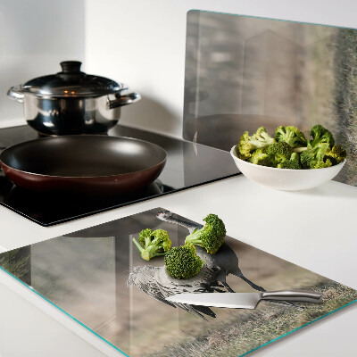 Schneidebrett Glas mit Motiv eines Krans vor einer Landschaft