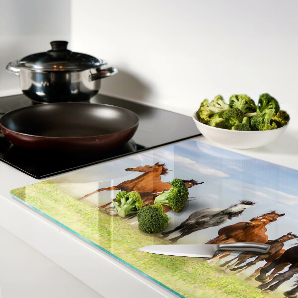 Schneidebrett Galoppierende Pferde auf der Wiese