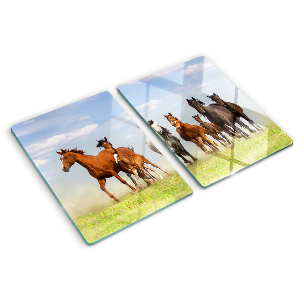 Schneidebrett mit Motiv galoppierender Pferde auf der Wiese