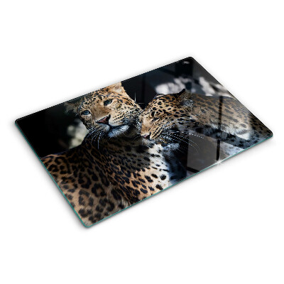 Schneidebrett Glas mit einem Geparden vor dunklem Hintergrund