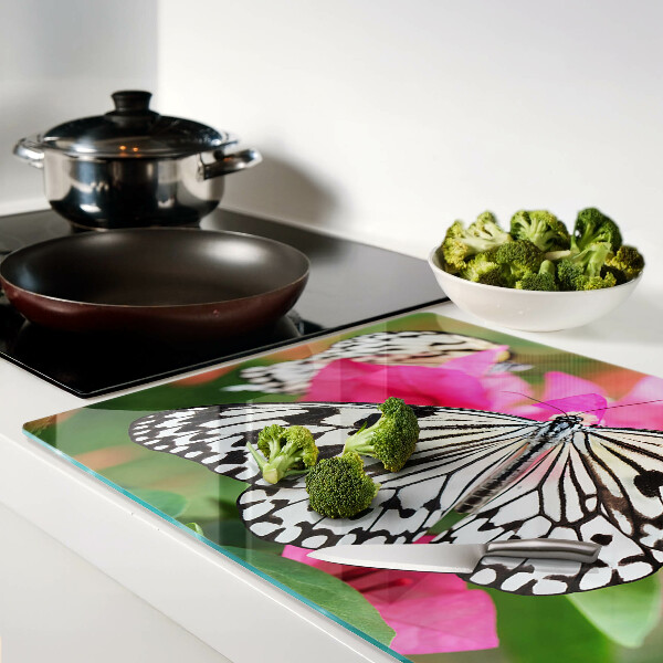 Glas schneidebrett Schmetterling auf Blumen