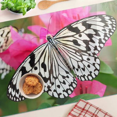 Glas schneidebrett Schmetterling auf Blumen