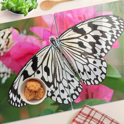 Glas schneidebrett Schmetterling auf Blumen