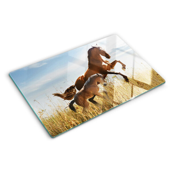 Schneidebrett Glas mit einem Motiv von Pferden auf einer sonnigen Wiese