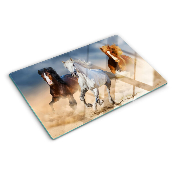 Glas-Schneidebrett mit Motiv dreier galoppierender Pferde