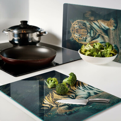 Glas-Schneidebrett mit Motiv eines liegenden Tigers auf Felsen