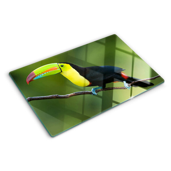 Schneidebrett mit Motiv eines Tukans auf einem Ast