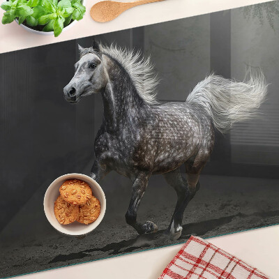 Glas-Schneidebrett mit dem Motiv eines gefleckten Pferdes in Bewegung