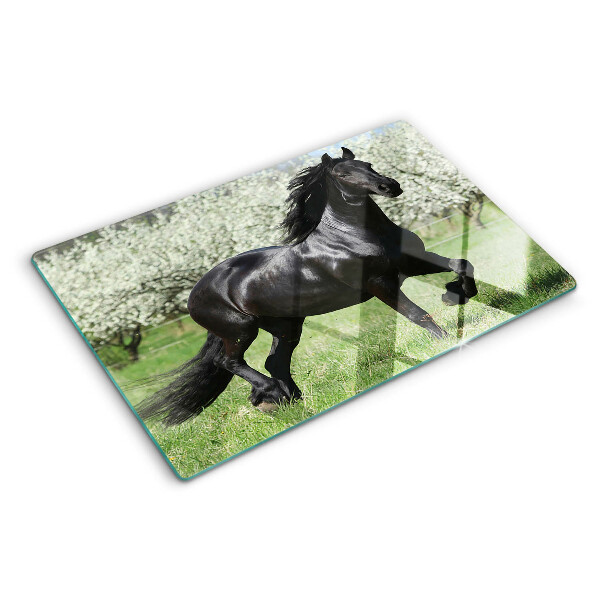 Schneidebrett Glas mit schwarzem Pferd auf der Wiese