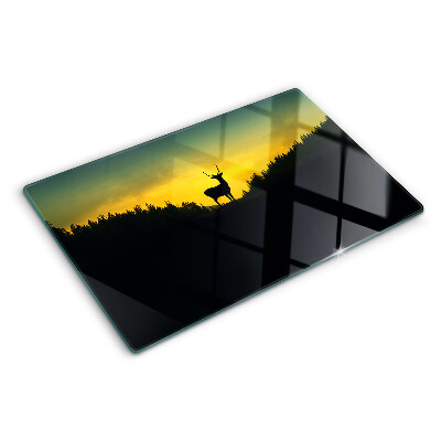 Schneidebrett mit Motiv von Hirschen vor einer untergehenden Sonne