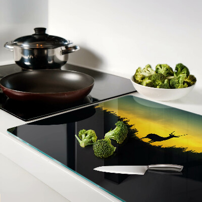 Schneidebrett Hirsche vor der untergehenden Sonne