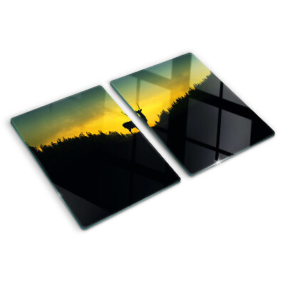 Schneidebrett mit Motiv von Hirschen vor einer untergehenden Sonne