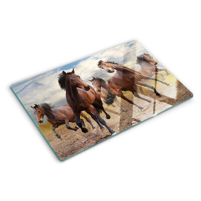 Schneidebrett mit Motiv von auf der Weide laufenden Pferden