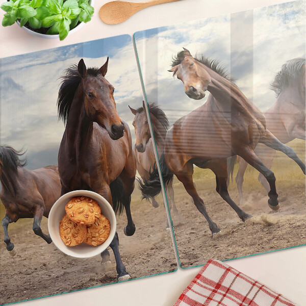 Schneidebrett mit Motiv von auf der Weide laufenden Pferden